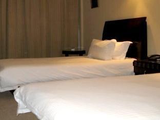 Baolong Homelike Hotel Luojing Branch Sanghaj Kültér fotó